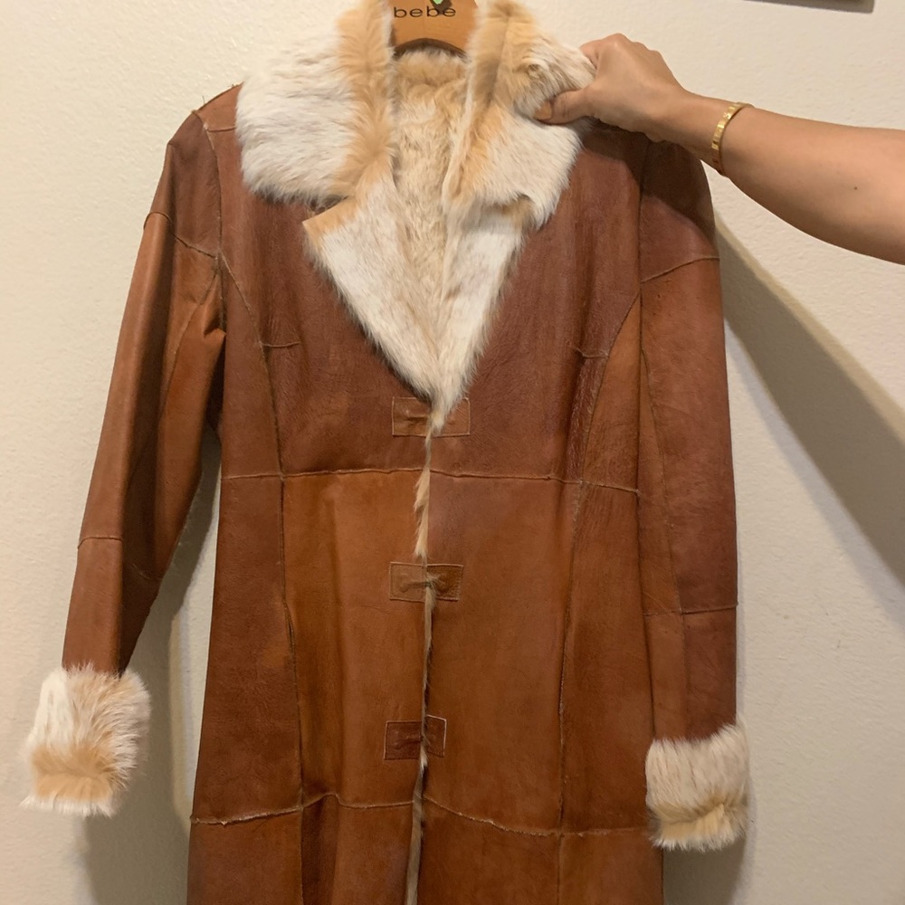 Leather coat with rabbit fur